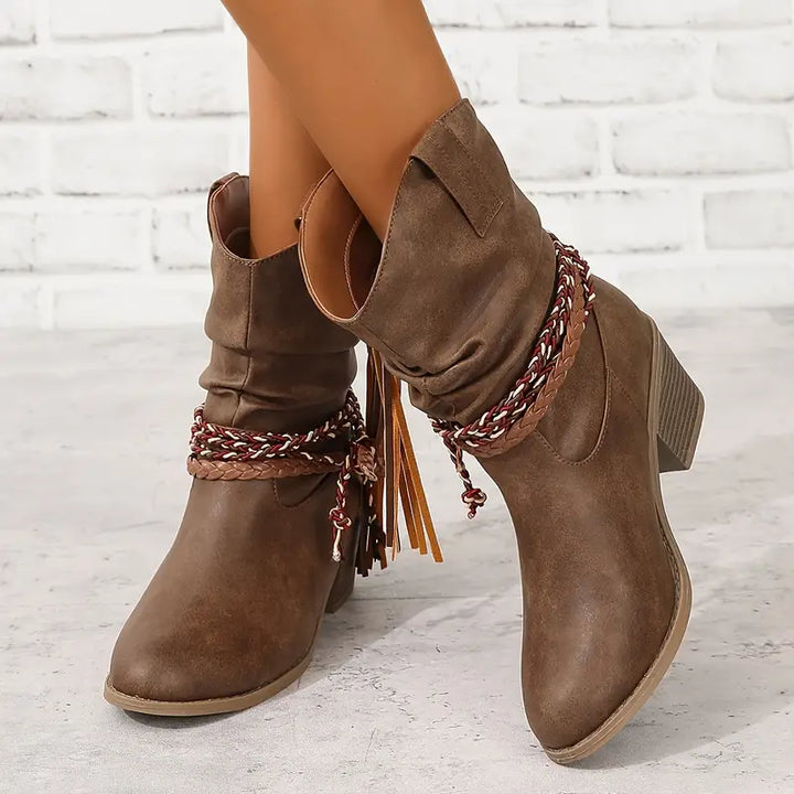 Front view showing slouched shaft, braided wraps, tassels and pull tab
