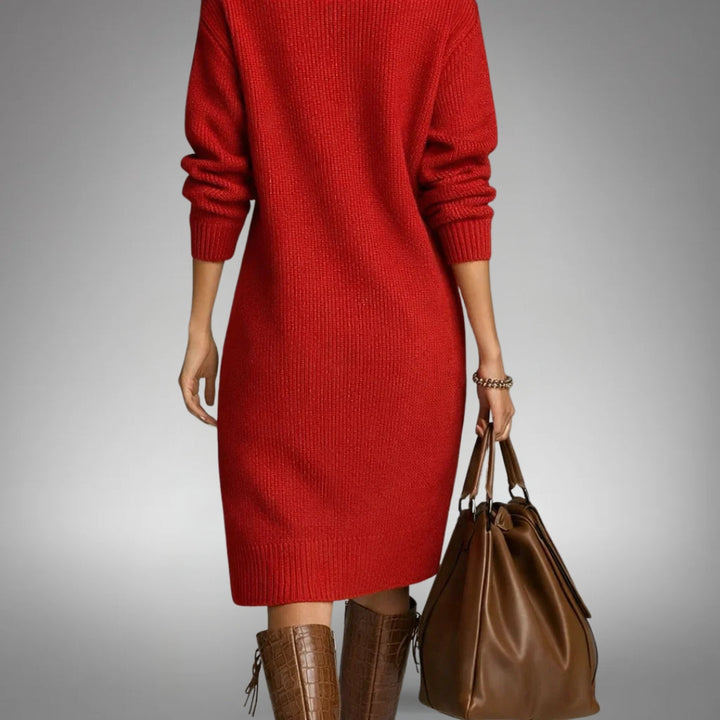 Back view showing long sleeves, banded cuffs and knee-length hem