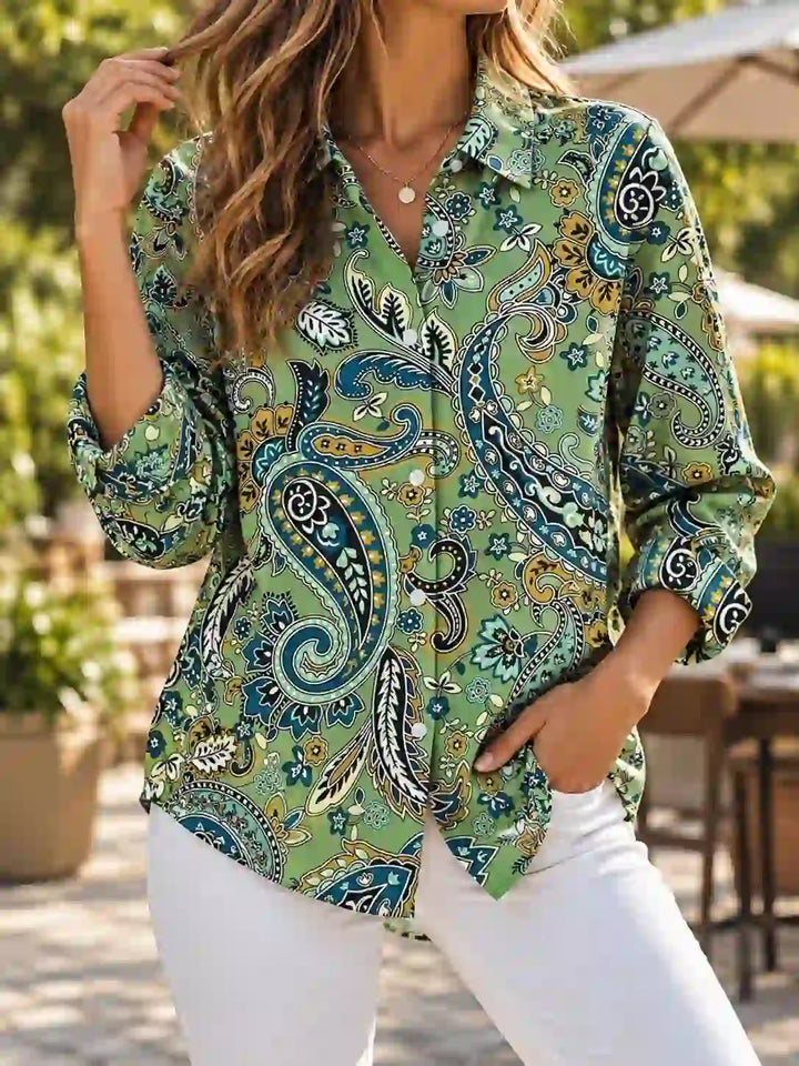 Front view showing shirt collar, long sleeves and button placket