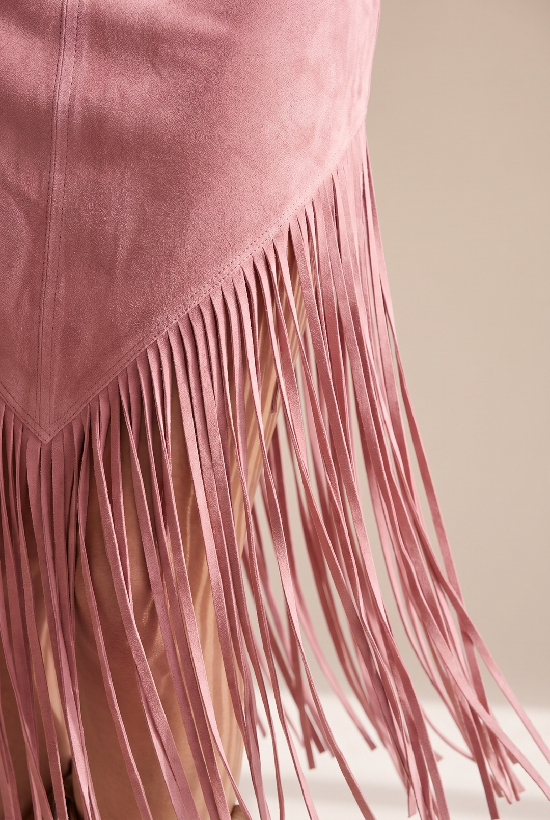 Detail view of skirt panel and fringe