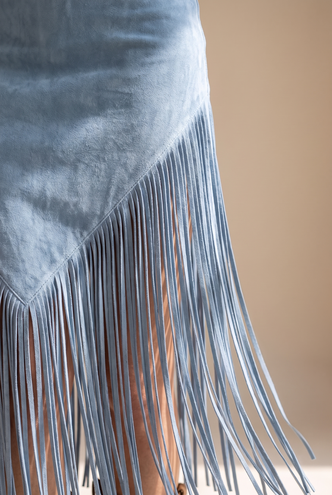 Detail view of pointed panel and fringe