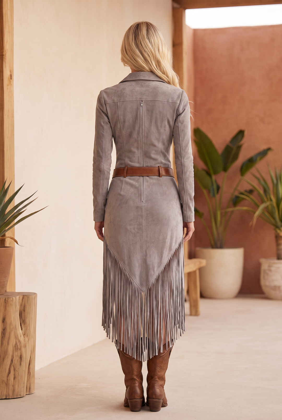 Back view showing back bodice, belt and fringe hem
