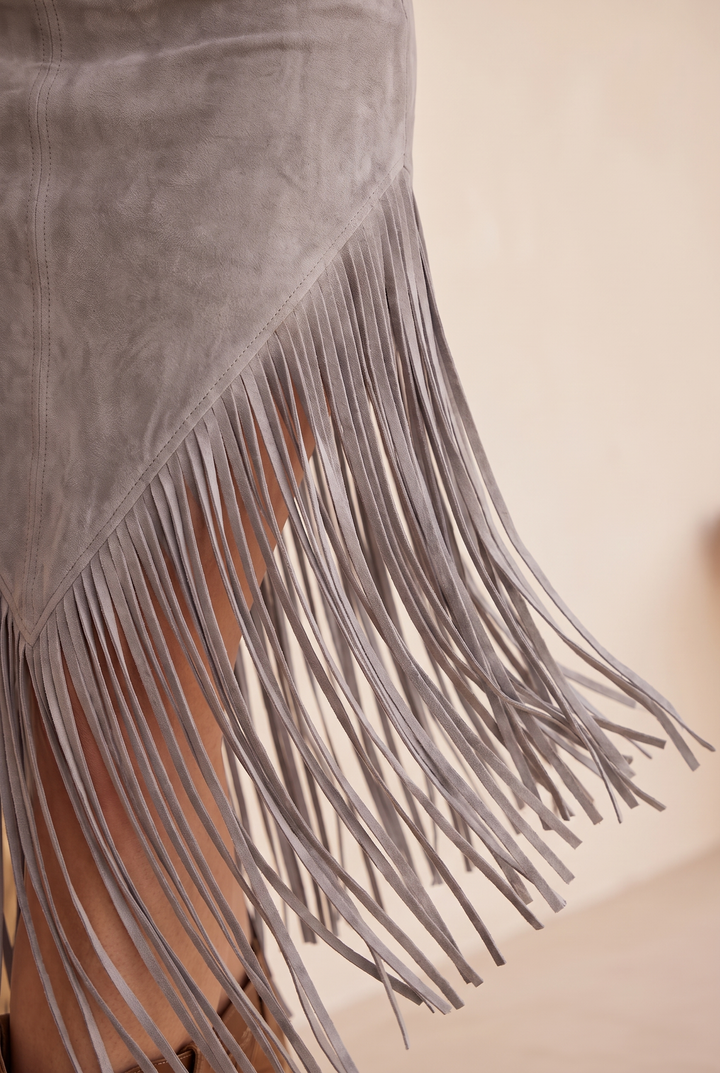 Detail view of skirt panel and fringe