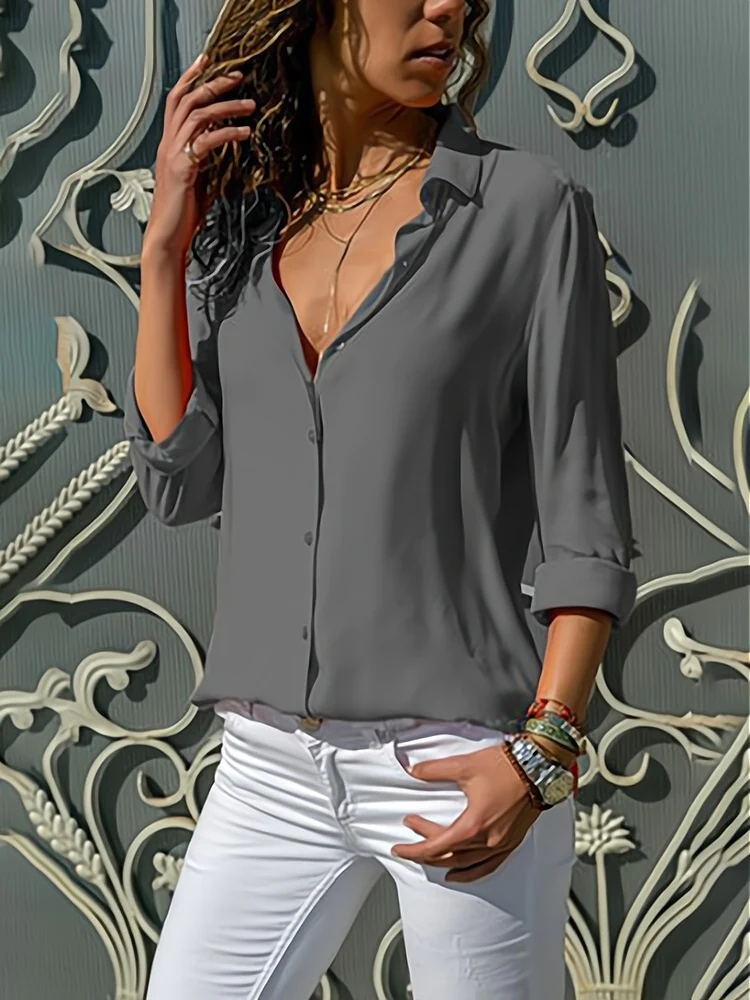Front view of blouse with shirt collar, button placket and long sleeves, gray