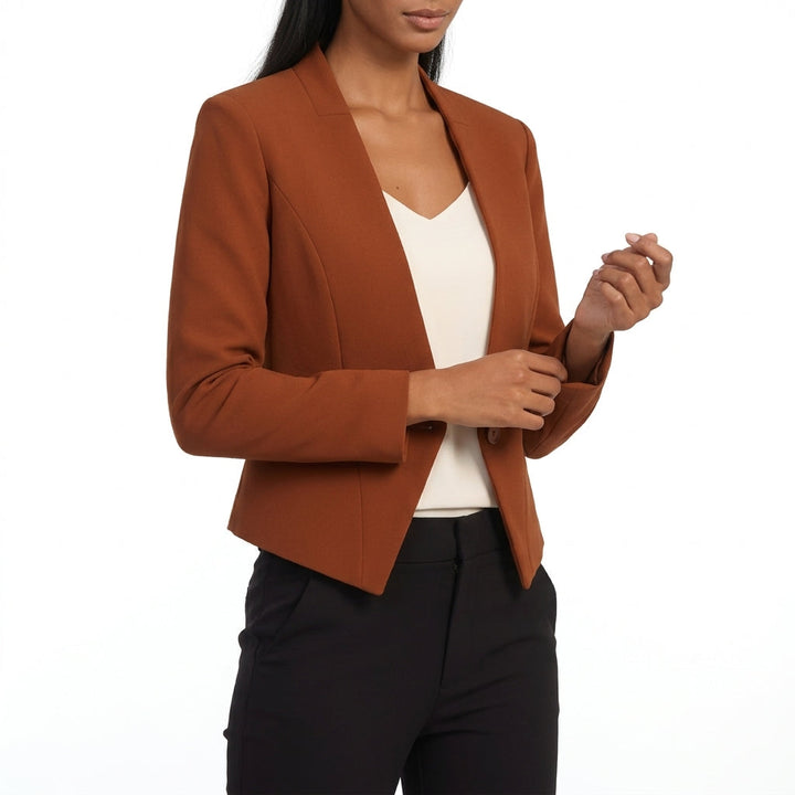 Side view of lapels and pointed front hem, rust