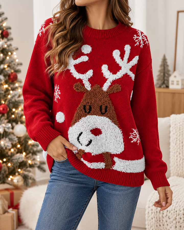 Front view showing round neckline, long sleeves and reindeer motif