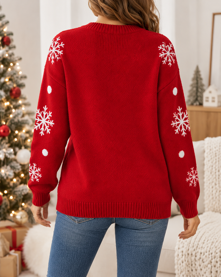 Back view showing back neckline and snowflake motifs on the sleeves