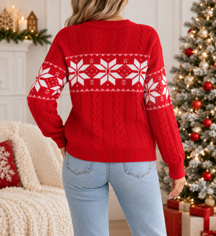 Back view of round neckline, long sleeves and snowflake pattern across back and sleeves