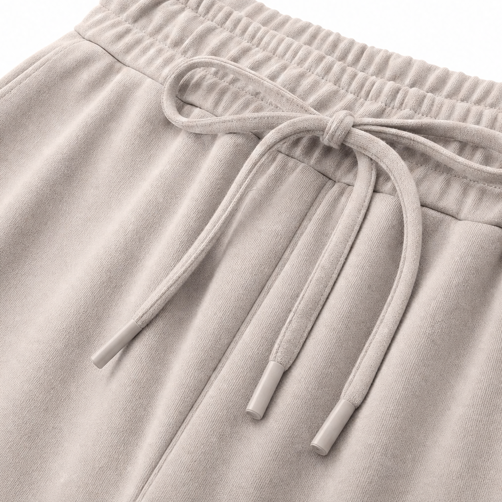 Detail of drawstring tie at the banded waist