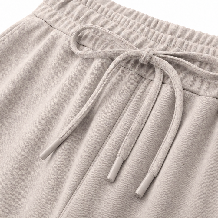 Detail of drawstring tie at the banded waist