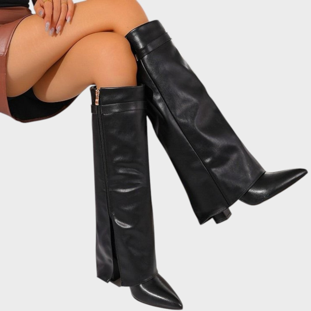 Front view of fold-over shafts, side zipper and pointed toes