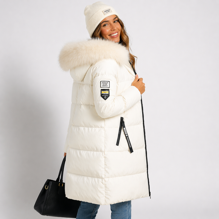 Side view showing hood and long sleeve with patch badge and zipper pull, white