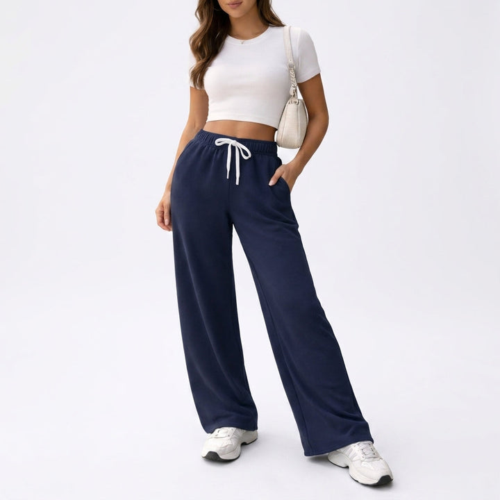 Front view showing drawstring waist, side pockets and wide legs, navy