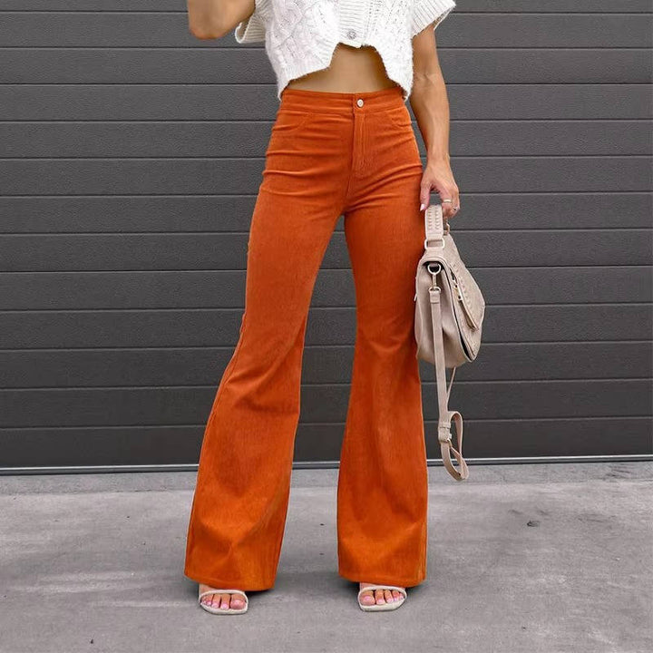 Front view showing high waist, button closure and flared legs, orange