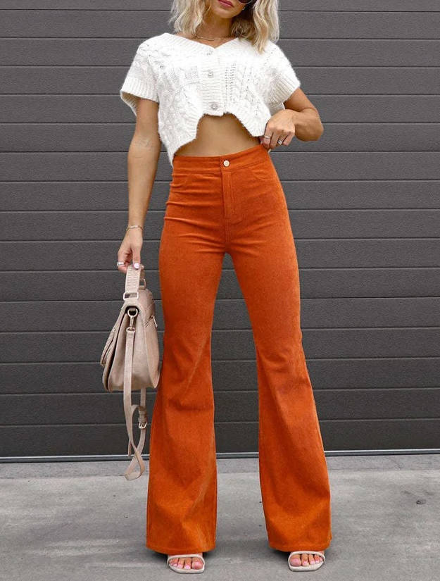Front view showing high waist, patch pockets and flared legs