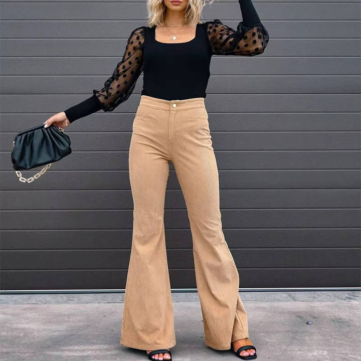 Front view showing high waist and flared legs, khaki