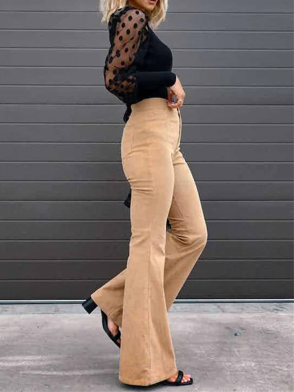 Side view showing side seam and flared leg