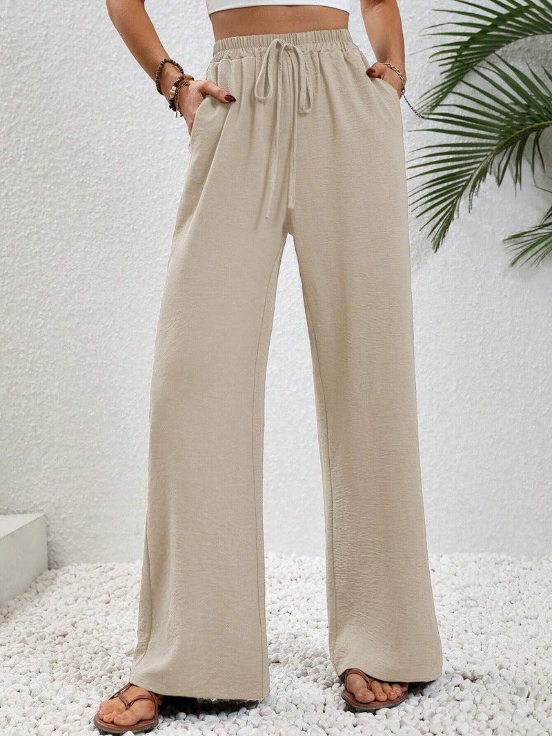 Front view of side pockets and wide legs, beige