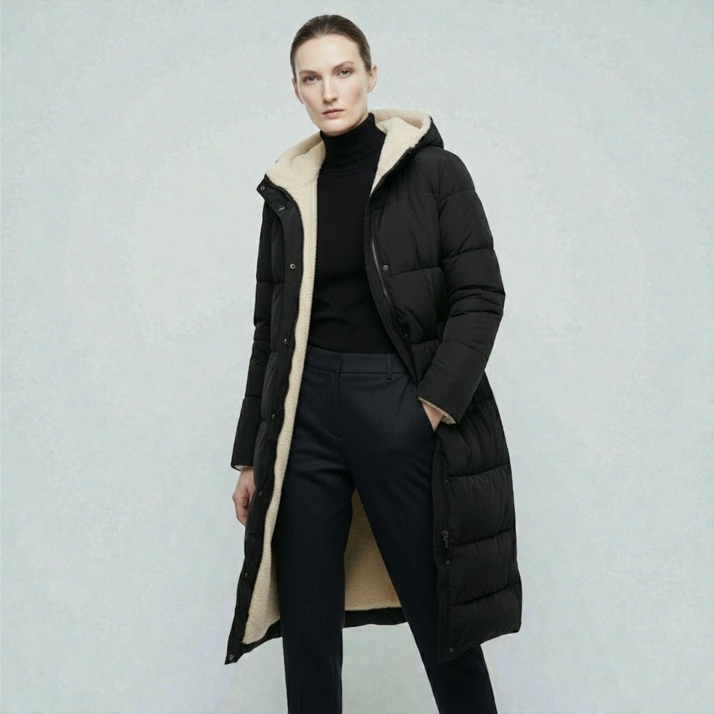 Side view showing hood, stand collar and zipper front, black