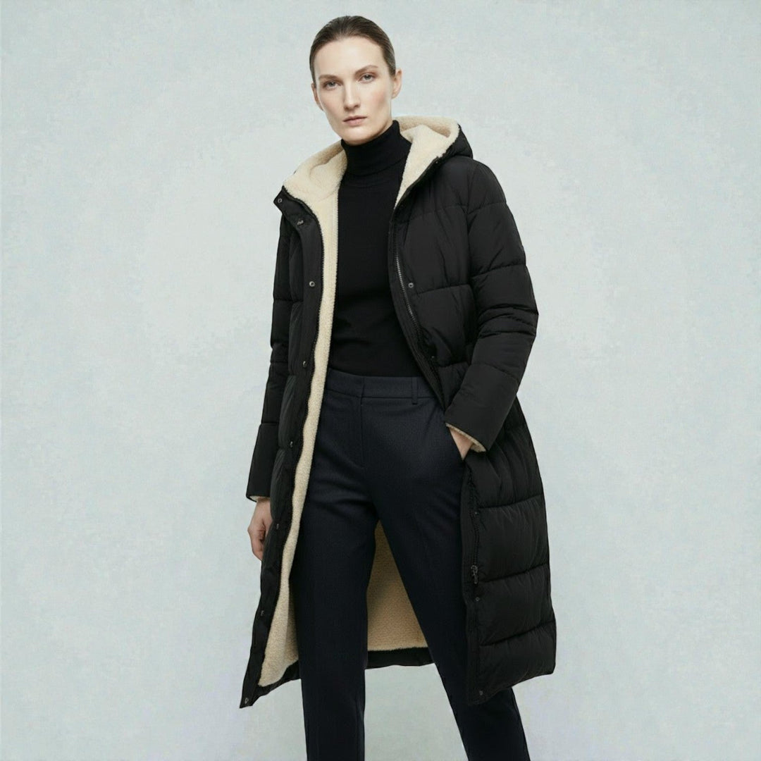 Side view showing hood, stand collar and zipper front, black