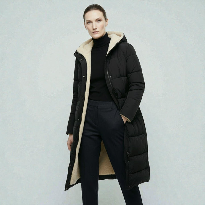Side view showing hood, stand collar and zipper front, black