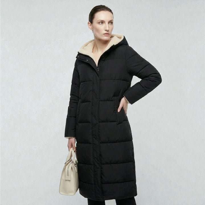 Front view showing hood, quilted body and side pocket
