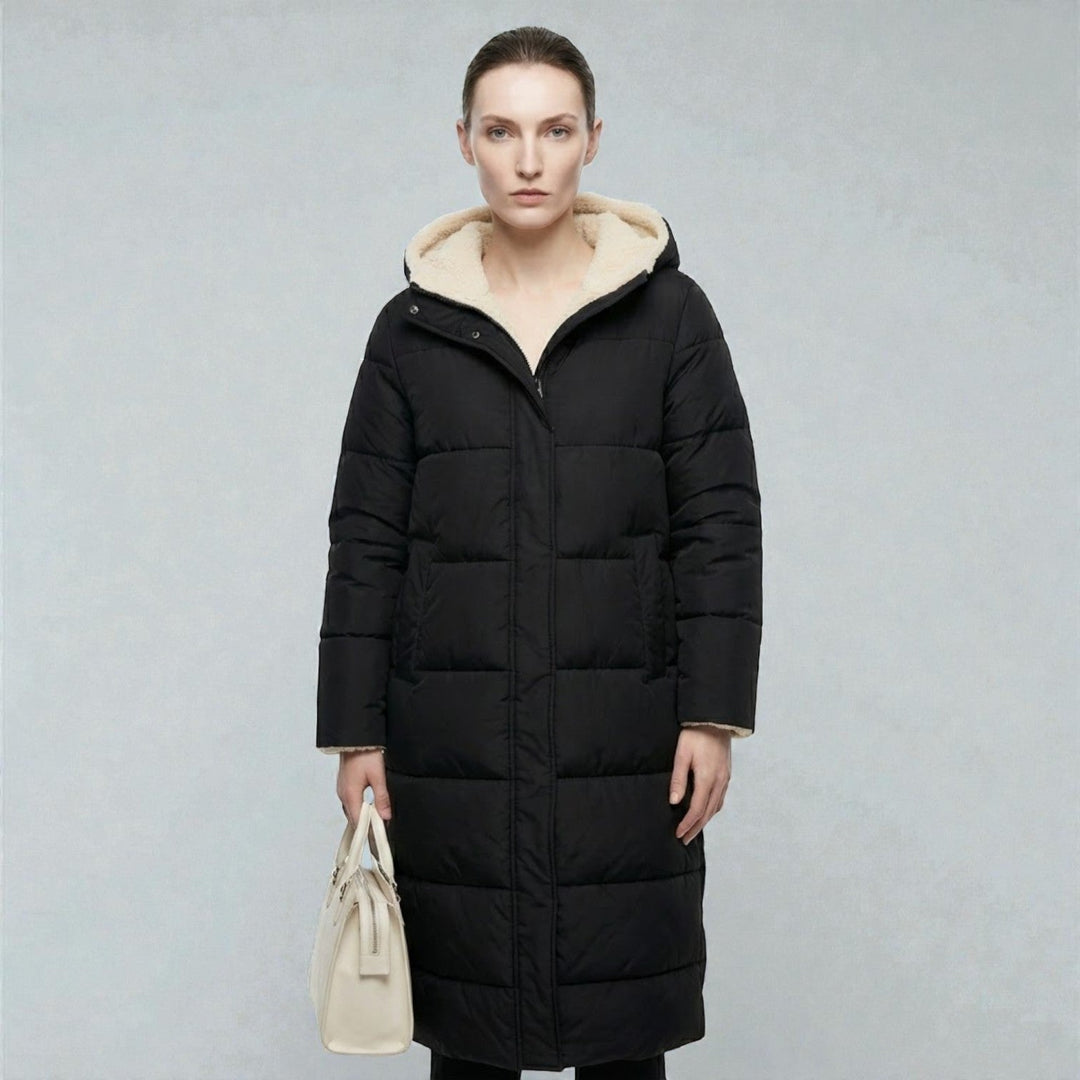Front view showing hood, stand collar and quilted body