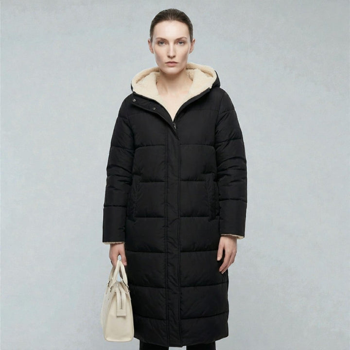 Front view showing hood, stand collar and quilted body