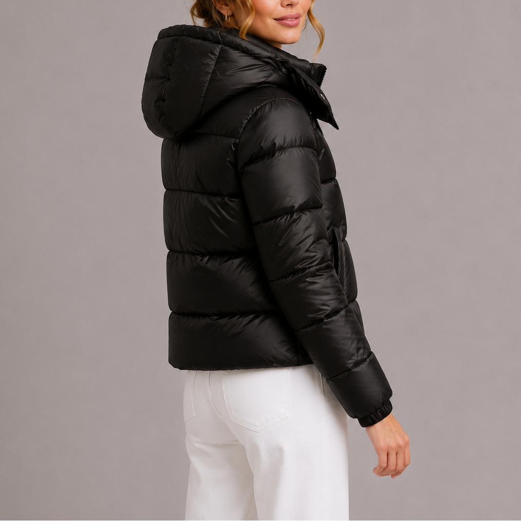 Back view showing the hood and quilted back with banded cuffs
