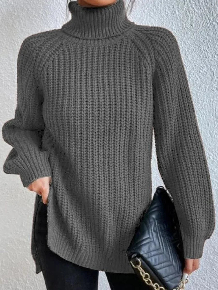 Front view of turtleneck sweater showing banded cuffs, gray