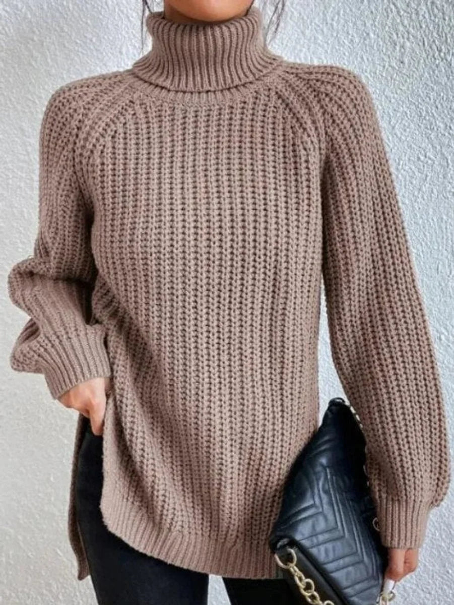 Front view of turtleneck sweater showing raglan sleeves, light brown