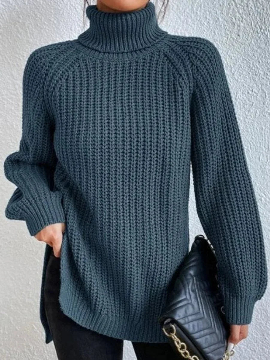 Front view of turtleneck sweater showing raglan sleeves, ocean blue