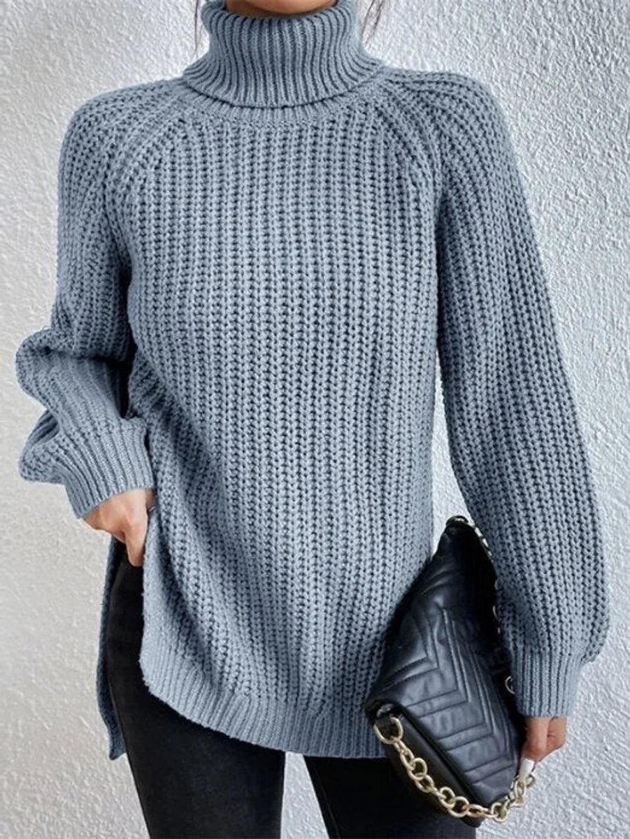 Front view of turtleneck sweater showing banded cuffs, sky blue