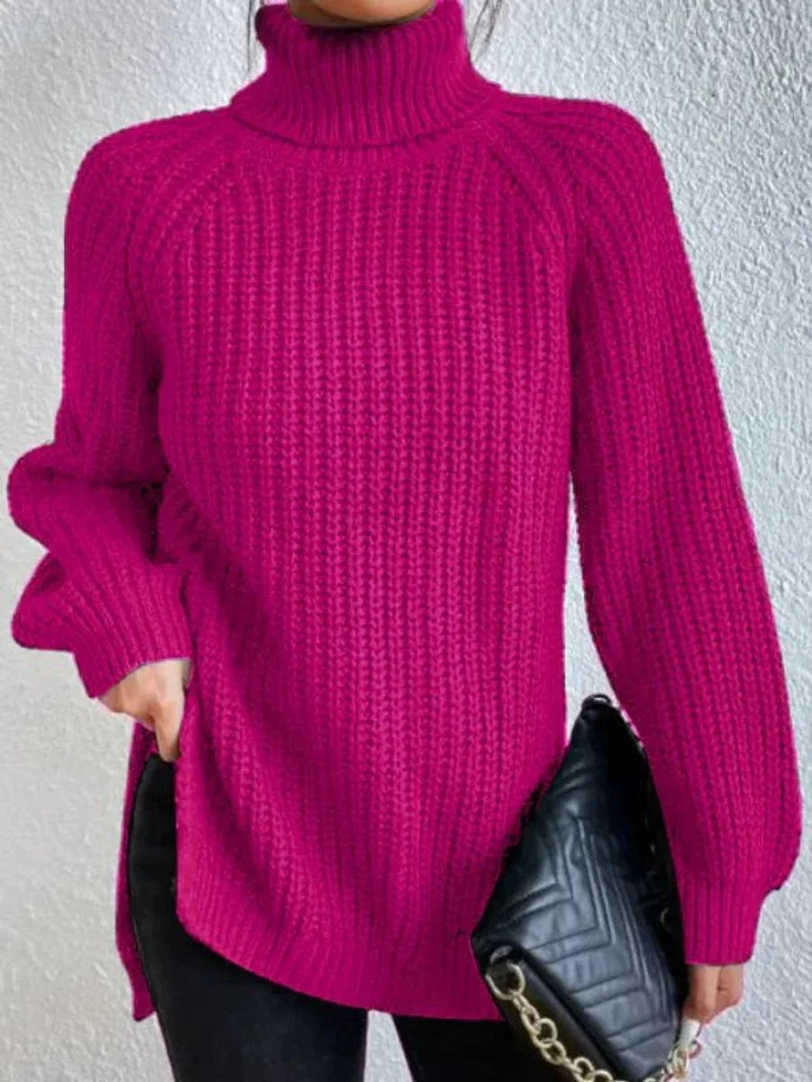 Front view of turtleneck sweater showing raglan sleeves, pink