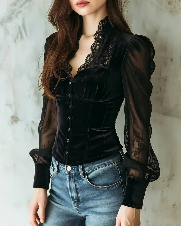 Side view showing stand collar, lace sleeve and banded cuff