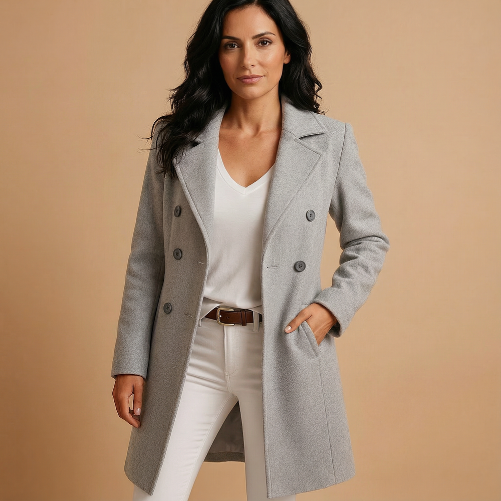 Front view showing lapels, double-breasted button closure and side pockets, gray