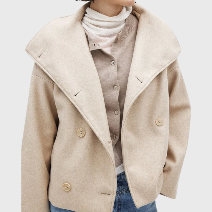 Front view with collared neckline, wide lapels and double-breasted buttons, beige