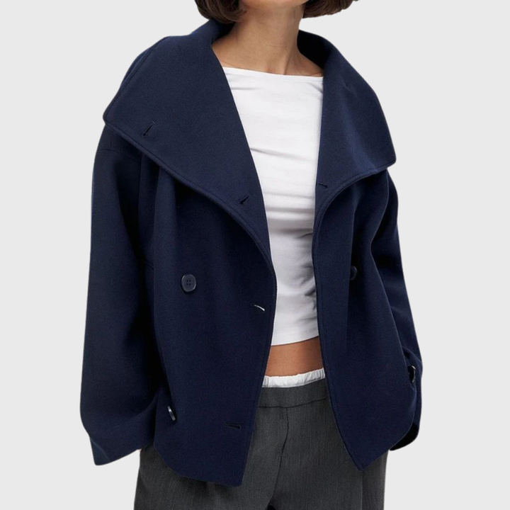 Front view with wide lapels, double-breasted buttons and side pockets