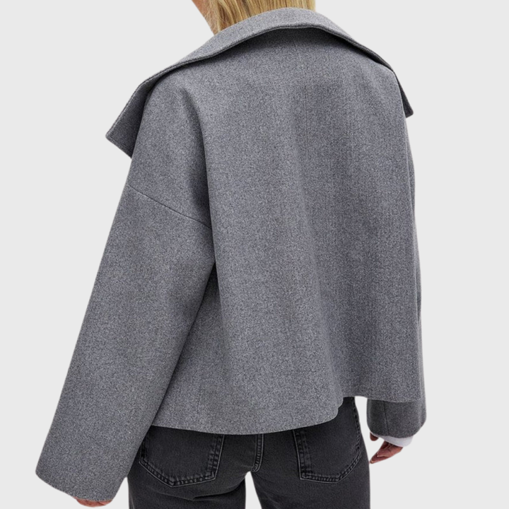 Back view showing collar, dropped shoulder seams and cropped hem