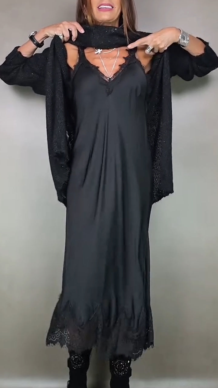 Detail view of v-neckline with lace edging on slip dress and sweater lifted