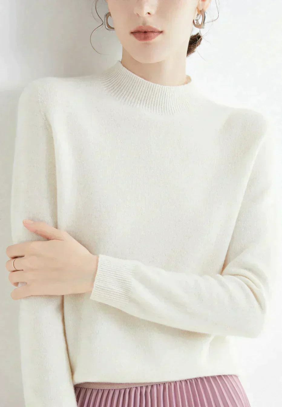 Front view of mock neckline and ribbed edging, white