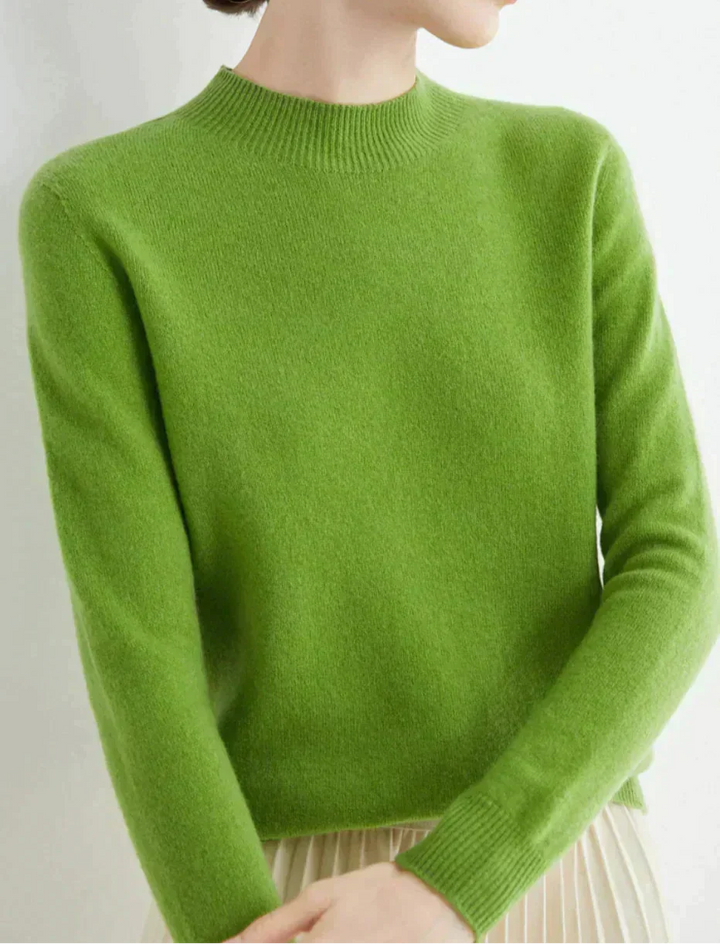 Front view of mock neckline and long sleeves, green