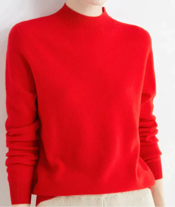 Front view of mock neckline and ribbed cuffs, red
