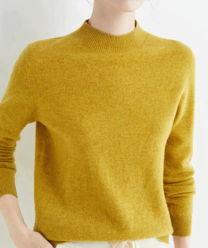 Front view of mock neckline and long sleeves, yellow
