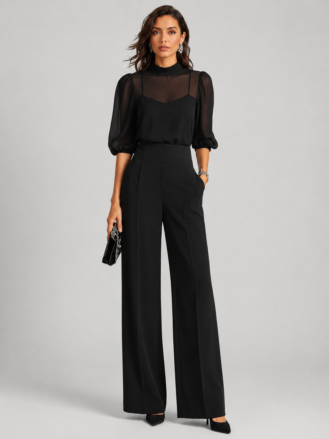 Front view showing mock neckline, puff sleeves and wide legs, black