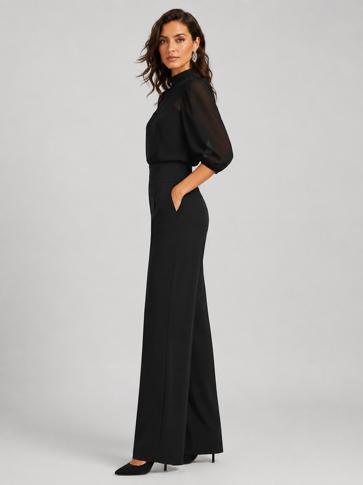 Side view showing puff sleeves, side pocket and wide legs