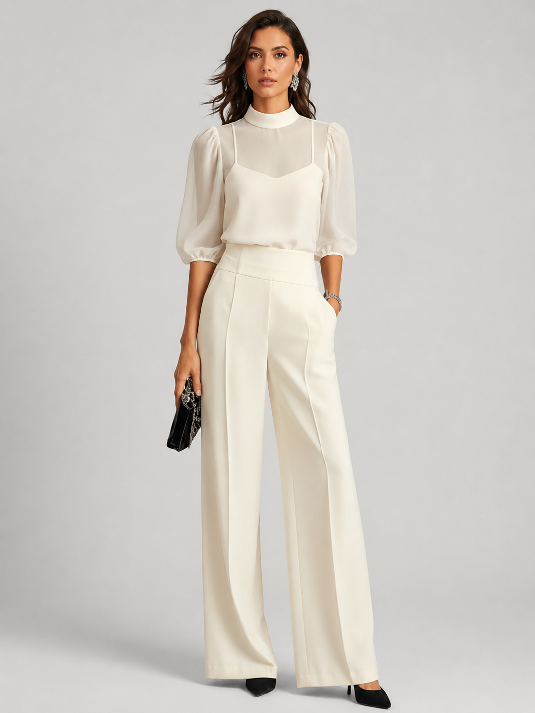 Front view showing mock neckline, puff sleeves and wide legs, white