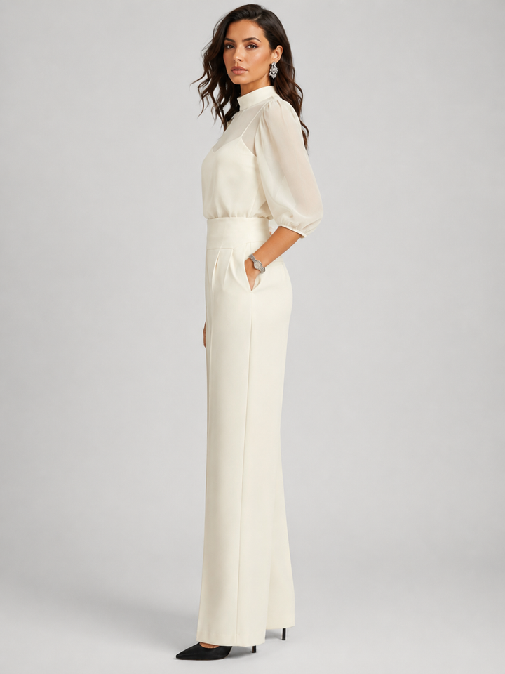 Side view showing puff sleeves and wide legs