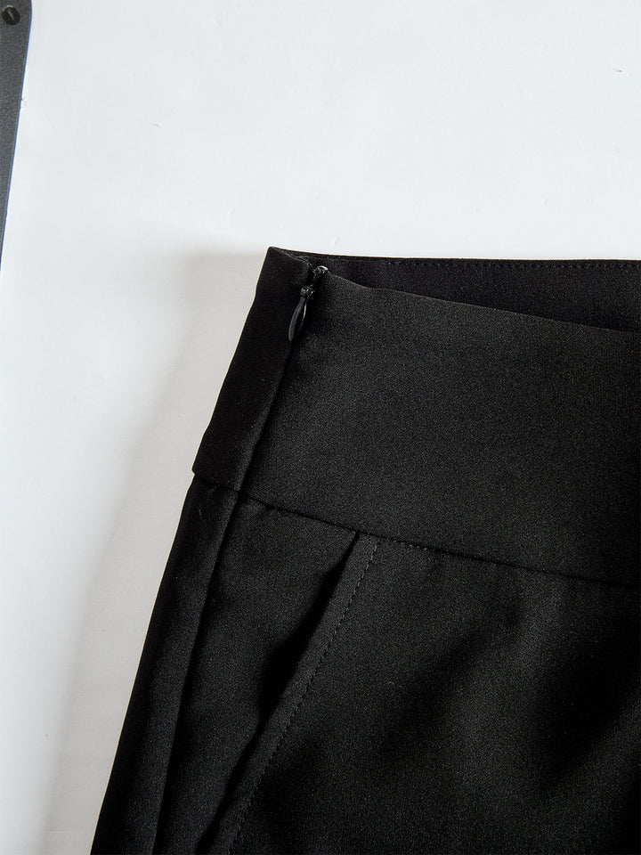 Detail view of banded waist with side zipper and side pocket