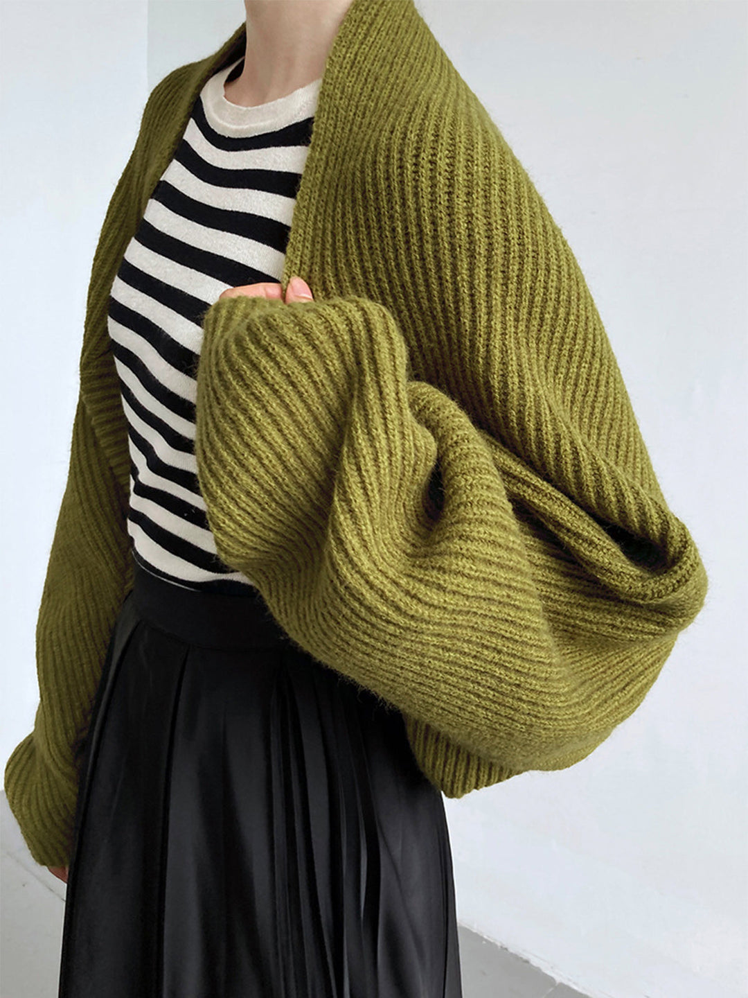 Side view of long sleeves and ribbed cuffs